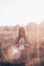 Girl closed her eyes, praying outdoors, Hands folded in prayer concept for faith, spirituality and religion. hope, dreams concept. Royalty Free Stock Photo