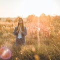 Girl closed her eyes, praying outdoors, Hands folded in prayer concept for faith, spirituality and religion. hope, dreams concept. Royalty Free Stock Photo