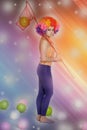 Girl clown and balloons Royalty Free Stock Photo
