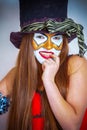 Girl clown with painted face. Royalty Free Stock Photo
