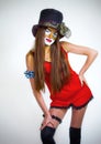 Girl clown with painted face. Royalty Free Stock Photo