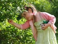 The girl collecting berries