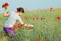 Girl collecting flowers Royalty Free Stock Photo