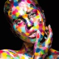 Girl with colored face painted. Art beauty image Royalty Free Stock Photo