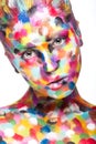 Girl with colored face painted. Art beauty image. Royalty Free Stock Photo