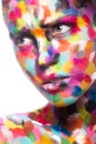 Girl with colored face painted. Art beauty image. Royalty Free Stock Photo