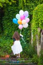 Girl with colorful balloons Royalty Free Stock Photo