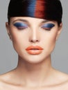 Girl with colorful make-up and hair
