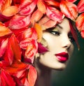 Girl with colourful autumn leaves hairstyle Royalty Free Stock Photo