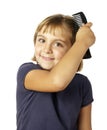 Girl combing hair Royalty Free Stock Photo