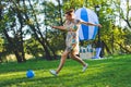 Girl compete in a relay race . play in soccer. They laugh and fall . Royalty Free Stock Photo