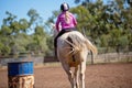 Girl Competing In Barrel Racing At Outback Country Rodeo Royalty Free Stock Photo