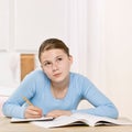 Girl concentrating on homework assignment