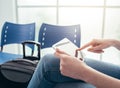 Girl connecting in the terminal waiting room