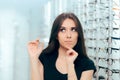Woman Thinking to Choose Contact Lenses Over Eyeglasses