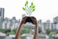 Girl with a controller in hand is virtually growing plants