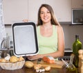 Girl cooking salmon fish Royalty Free Stock Photo