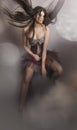 A girl in a corset flying Royalty Free Stock Photo