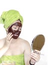 Girl with cosmetic mask Royalty Free Stock Photo