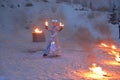 girl cosplaying snow queen holding a fire wrap in her hand, Republic of Karelia, Ruskealla mountain park, 07/01/2019