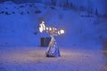 girl cosplaying snow queen holding a fire wrap in her hand, Republic of Karelia, Ruskealla mountain park, 07/01/2019