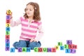 Girl counting numbers with kids blocks Royalty Free Stock Photo