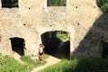 Girl on courtyard of castle Girls Stone Royalty Free Stock Photo