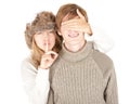 Girl covering boyfriend's eyes, keeping silent Royalty Free Stock Photo