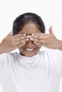 Girl covering her eyes with her hands. Conceptual image Royalty Free Stock Photo