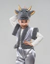 Girl in a cow costume shows the horns Royalty Free Stock Photo