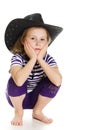 Girl cowboy in a black hat Royalty Free Stock Photo