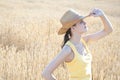 Girl with cowboy hat in wheat field Royalty Free Stock Photo