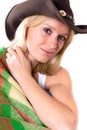 Girl in a cowboy hat with wrapped in a plaid Royalty Free Stock Photo