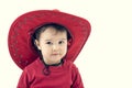 Girl cowboy in a red hat on a white Royalty Free Stock Photo