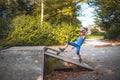 A girl crashes while skateboarding on a ramp Royalty Free Stock Photo