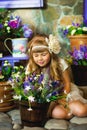 The girl in a cream dress with lilac flowers Royalty Free Stock Photo