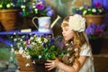 The girl in a cream dress with lilac flowers Royalty Free Stock Photo