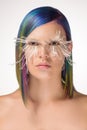 Girl with creative make up, very long false eyelashes and professional hair colouring Royalty Free Stock Photo