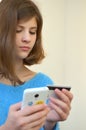 Girl with credit card. Shopping in the online shop Royalty Free Stock Photo