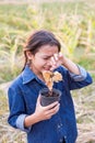 Girl crying over dead tree Royalty Free Stock Photo