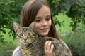 Girl cuddling with her cat Royalty Free Stock Photo