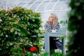 Girl with cup of coffee in autumn season garden Royalty Free Stock Photo