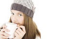 Girl with a cup of hot drink. Royalty Free Stock Photo