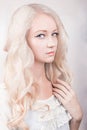 Girl with curly blond hair Royalty Free Stock Photo