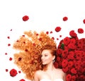 Girl with curly red hair and beautiful red roses