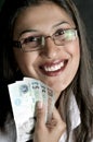 Girl with currency Royalty Free Stock Photo