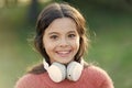 Girl cute child with headphones. Reasons you should use headphones. Headphones changed world. Headphones bring privacy