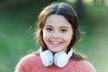 Girl cute child with headphones. Reasons you should use headphones. Headphones changed world. Headphones bring privacy