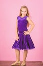 Girl cute child wear velvet violet dress. Clothes for ballroom dance. Ballroom dancewear fashion concept. Kid dancer