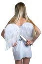 Girl cuts off the white angel wings Royalty Free Stock Photo